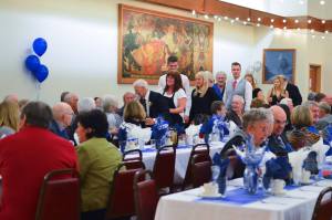 100th b'day Knut with server behind him